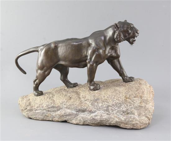 Pierre Granet (1843-1910). A French Art Deco bronze model of a tiger, height 12.5in. length 18in.